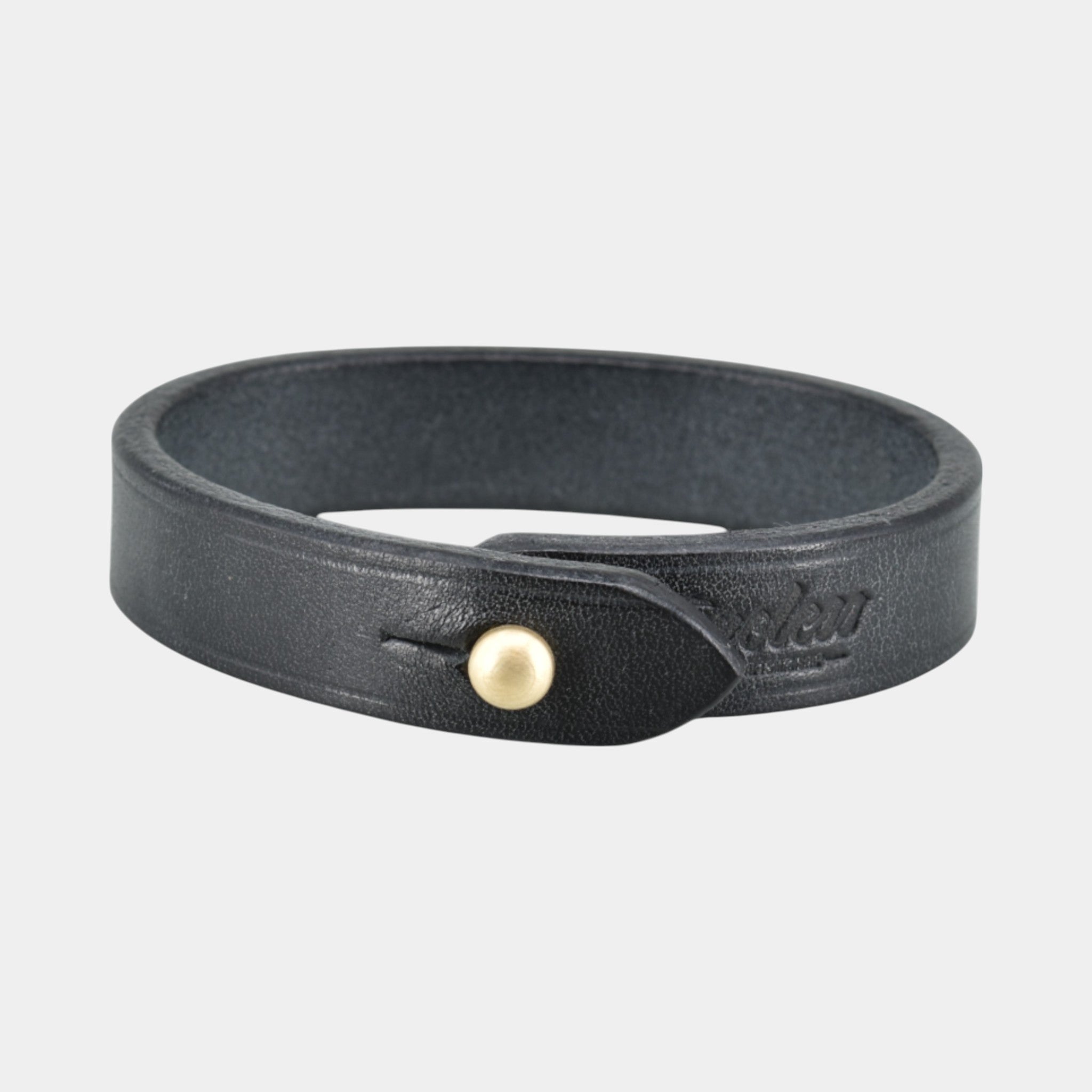 schwarzes Lederarmband mit Messingverschluss 