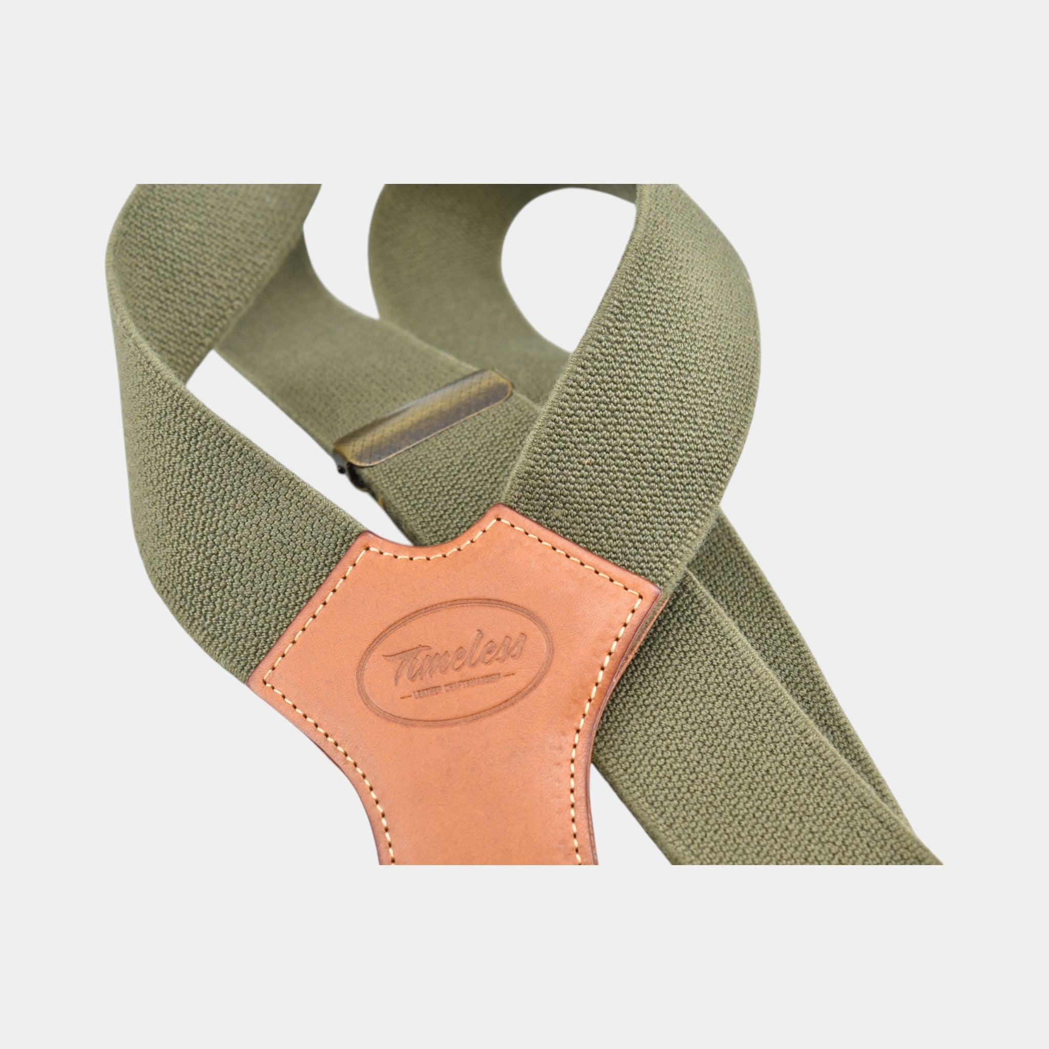 Vintage Hosenträger mit oliv grünem Band und natur leder laschen